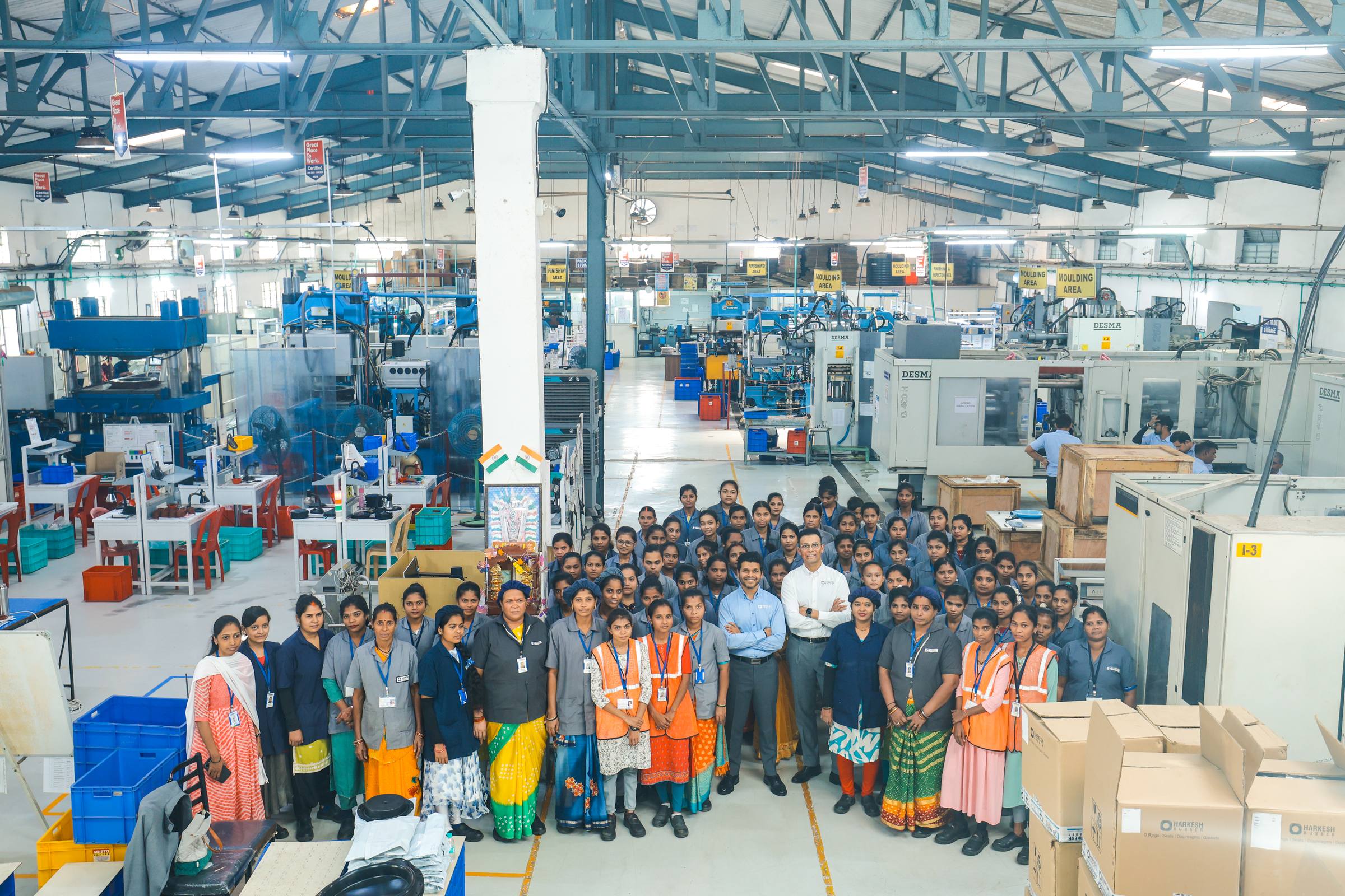 The Harkesh Rubber team on the moulding floor, with DESMA injection presses and compression moulding bays